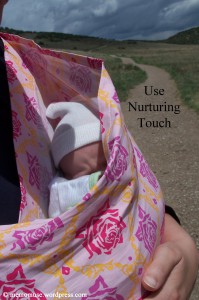 Newborn in a sling