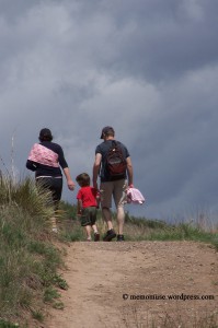 Family hiking on trail