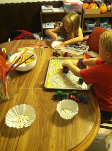 kids making crafts and Nathan harvesting corn - 2015